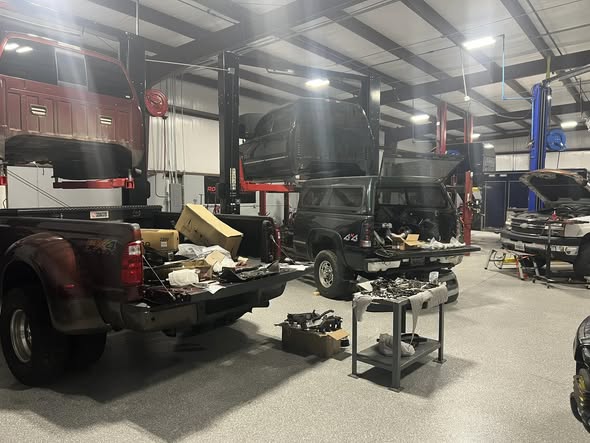 Fleet vehicles in shop